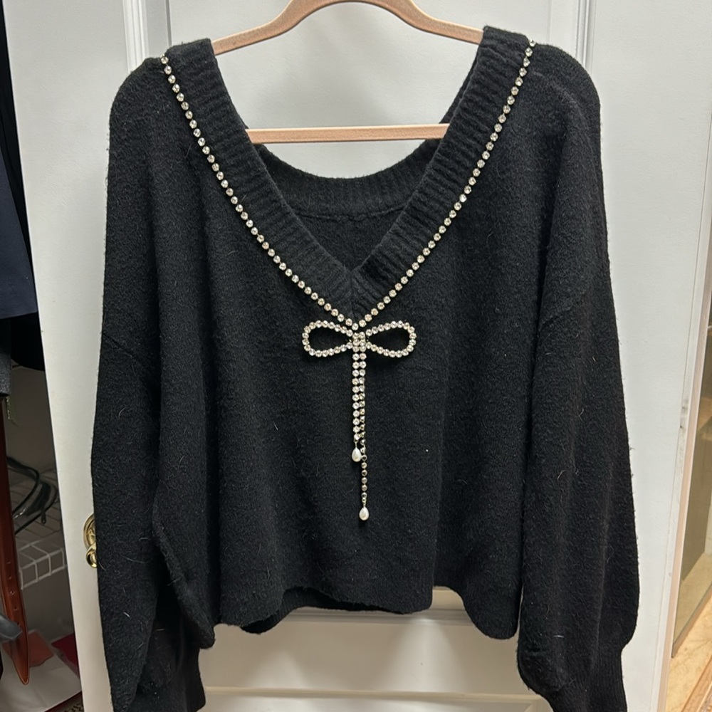 Express black rhinestone bow embellished sweater